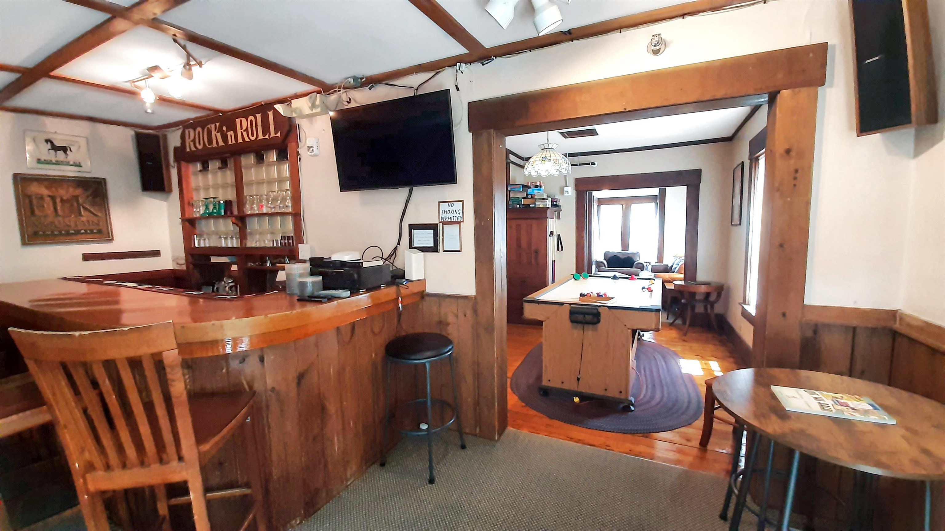 Back Tavern Connects to Room with Game Table 25583255