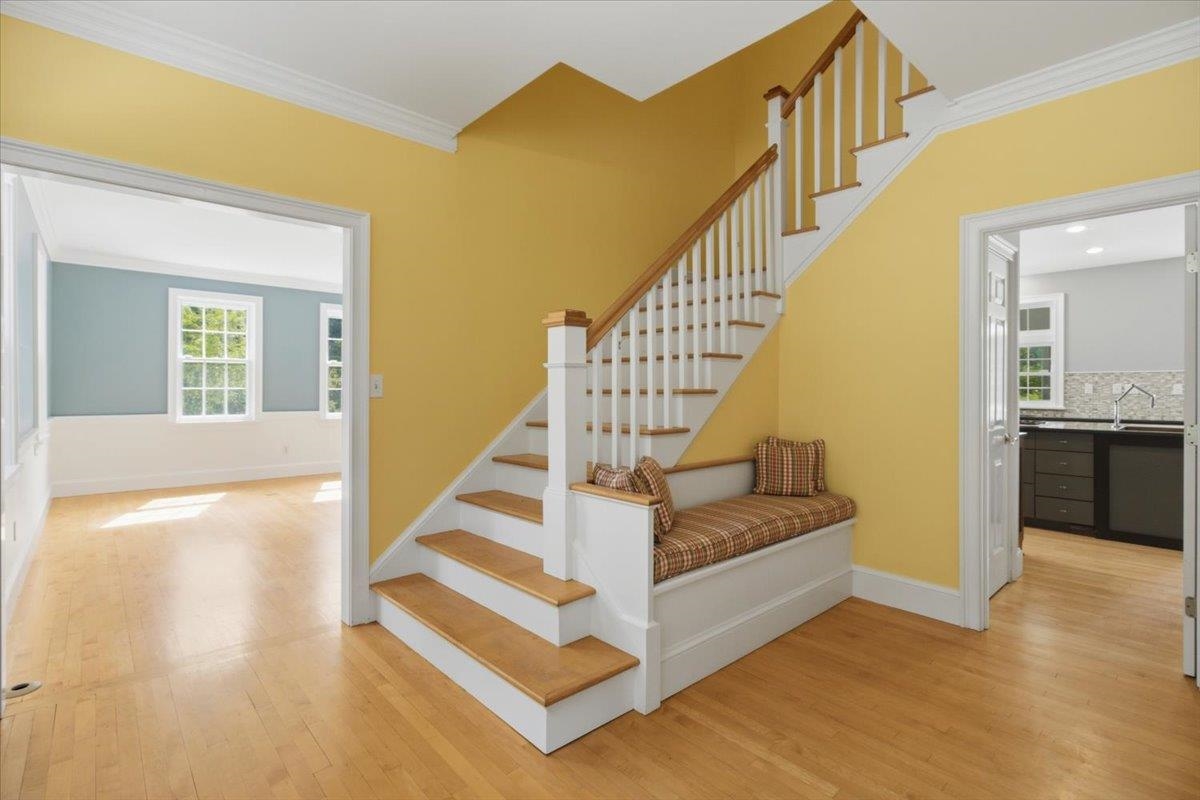 Elegant Main Entrance features seating area!
