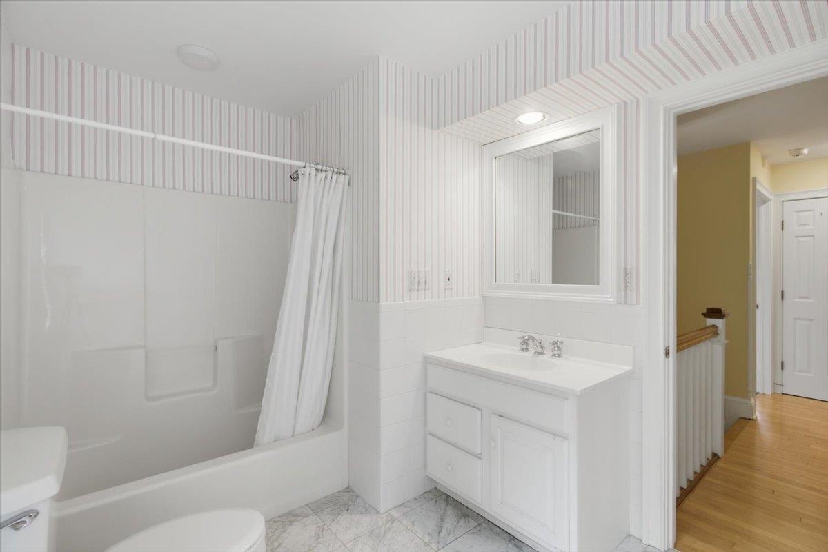 Hall Bath, includes tub/shower, at the top of the stairs.