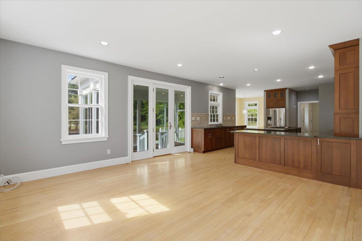 Family Room, open to Kitchen, with door to Sun Room...