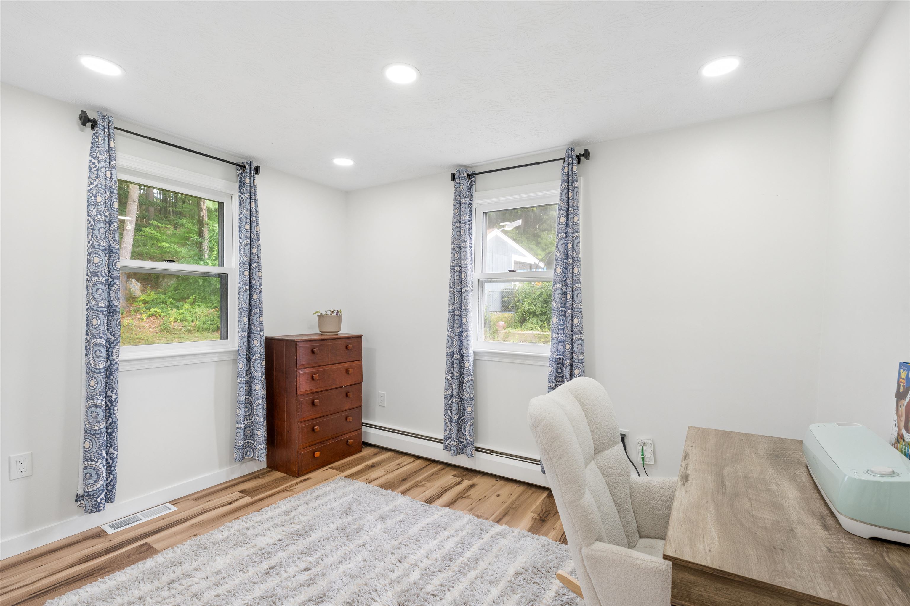 Main level bedroom, with closet used as an office