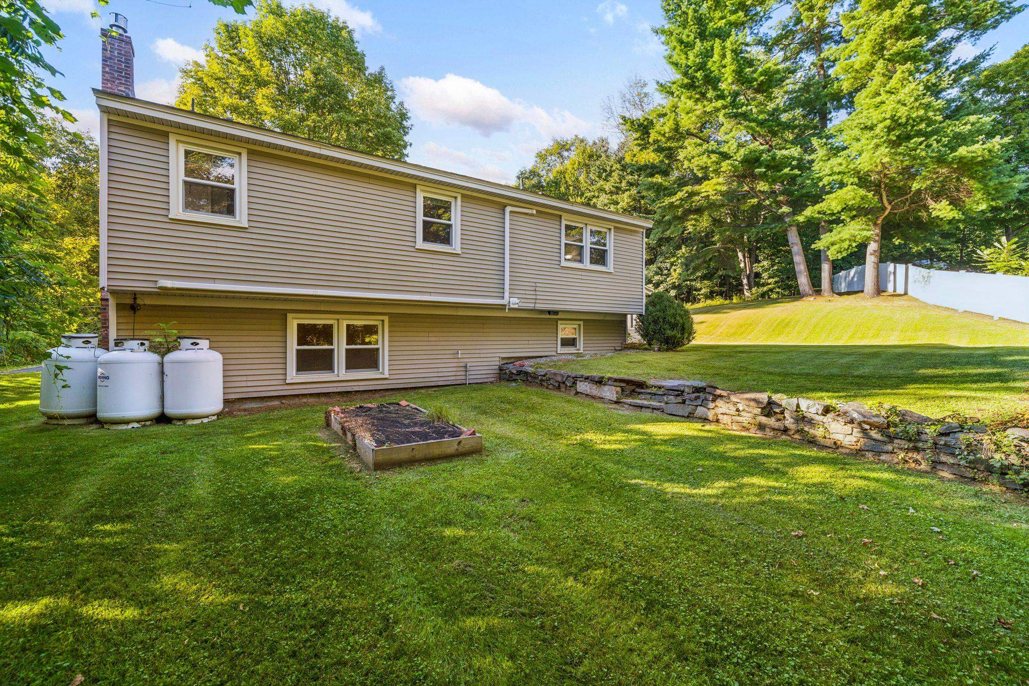 Side yard with raised bed