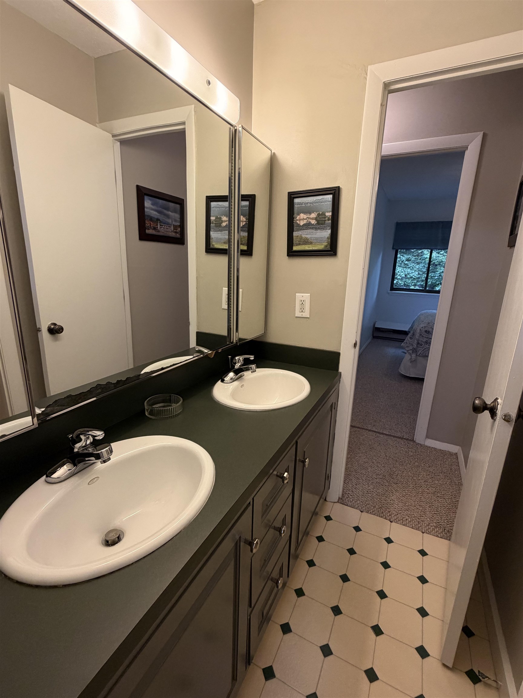 Separate sink area, accessed by hall and bedroom
