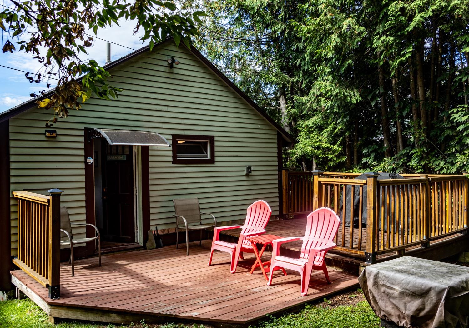 Lovely deck to sit and enjoy the quiet back yard