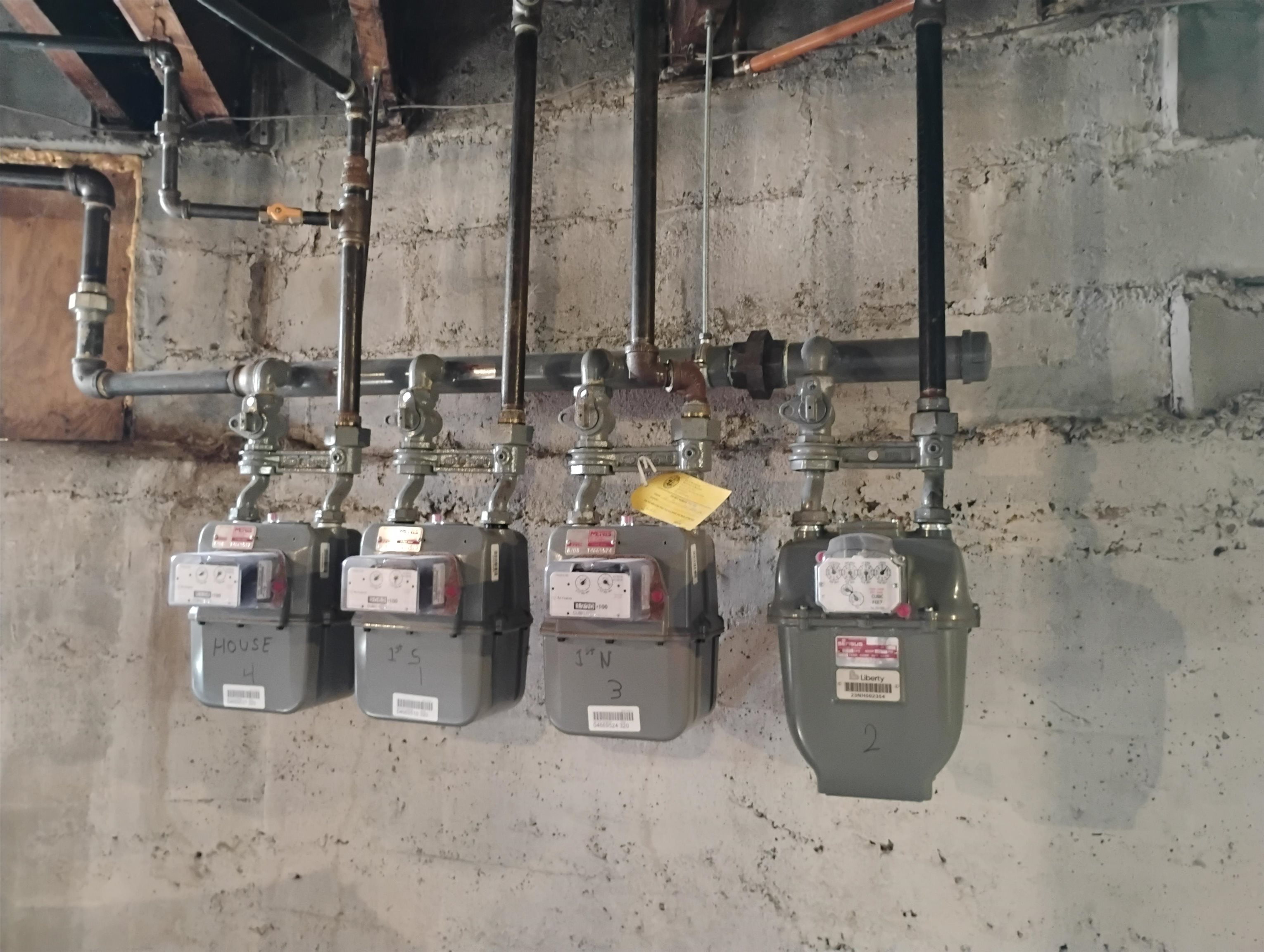 4 NATUAL GAS METERS AS RESIDENTS PAY ALL SEPARATE HEAT & HOT WATER