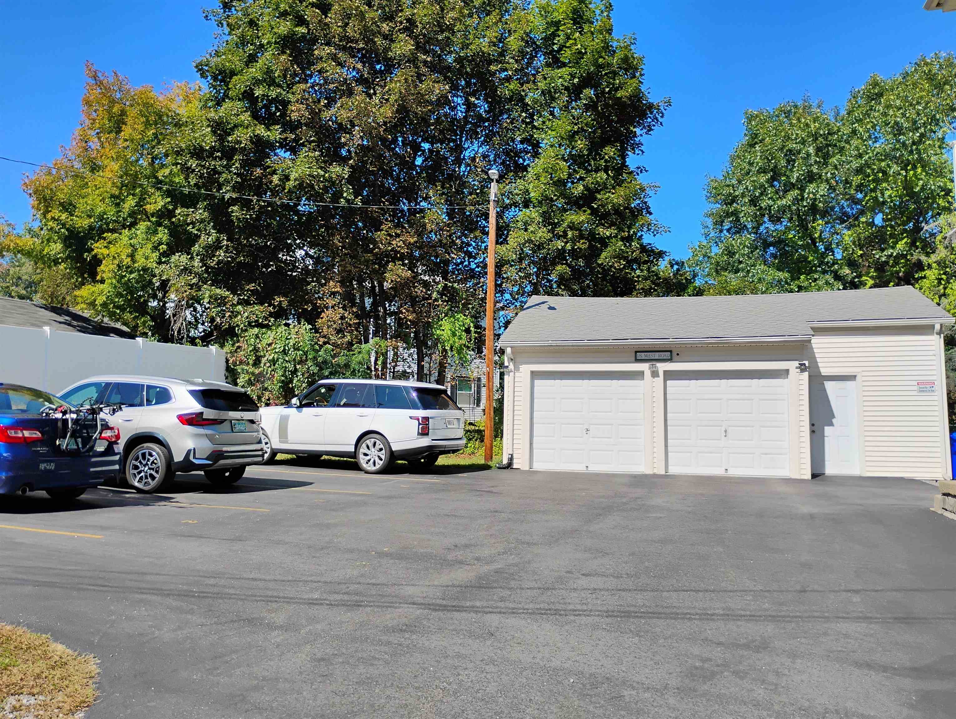GENEROUS PAVED PARKING FOR 6 CARS & 2-CAR GARAGE