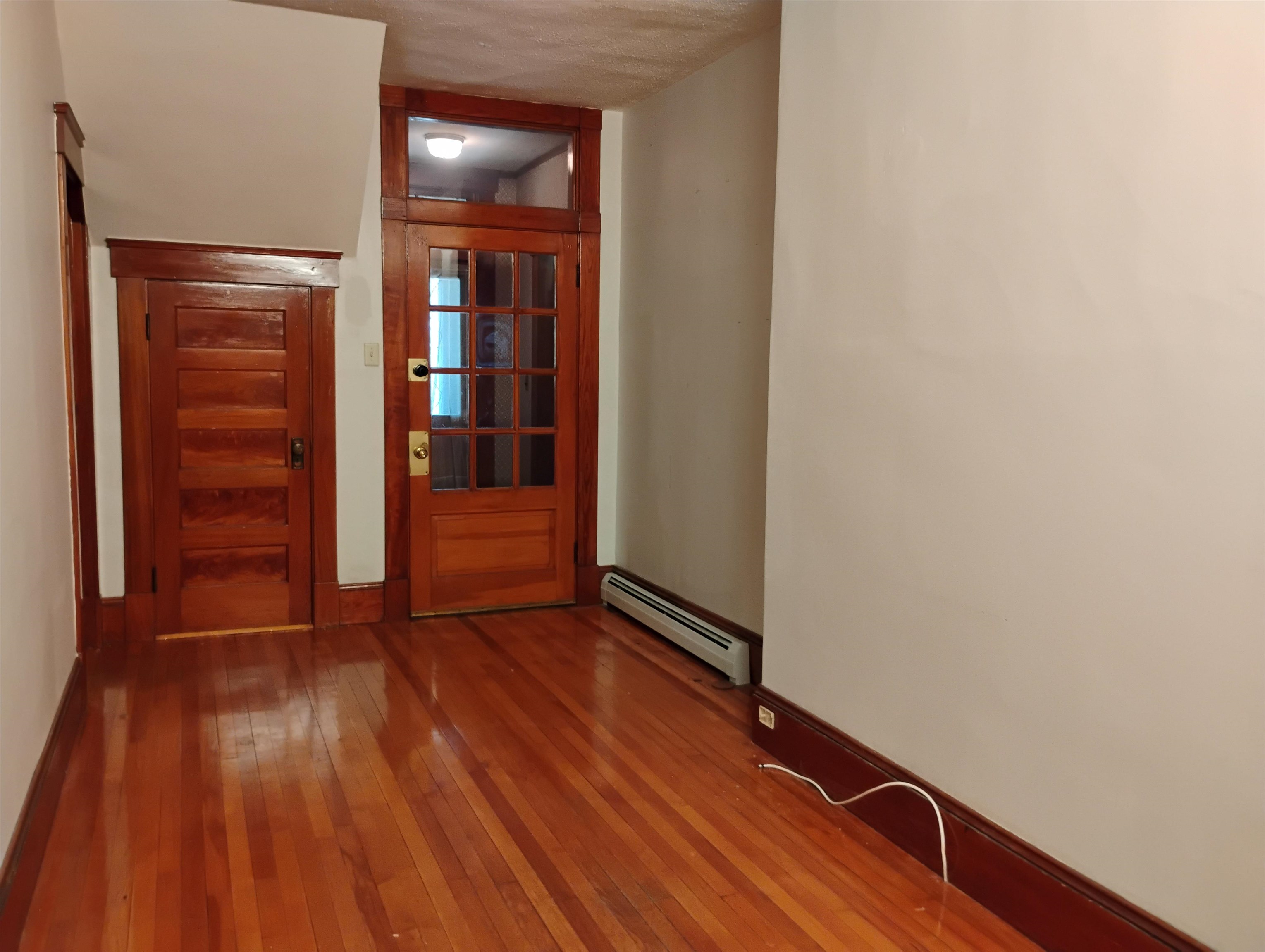 OFFICE OR LIVING ROOM (IN THE TWO NORTH SIDE APARTMENTS)