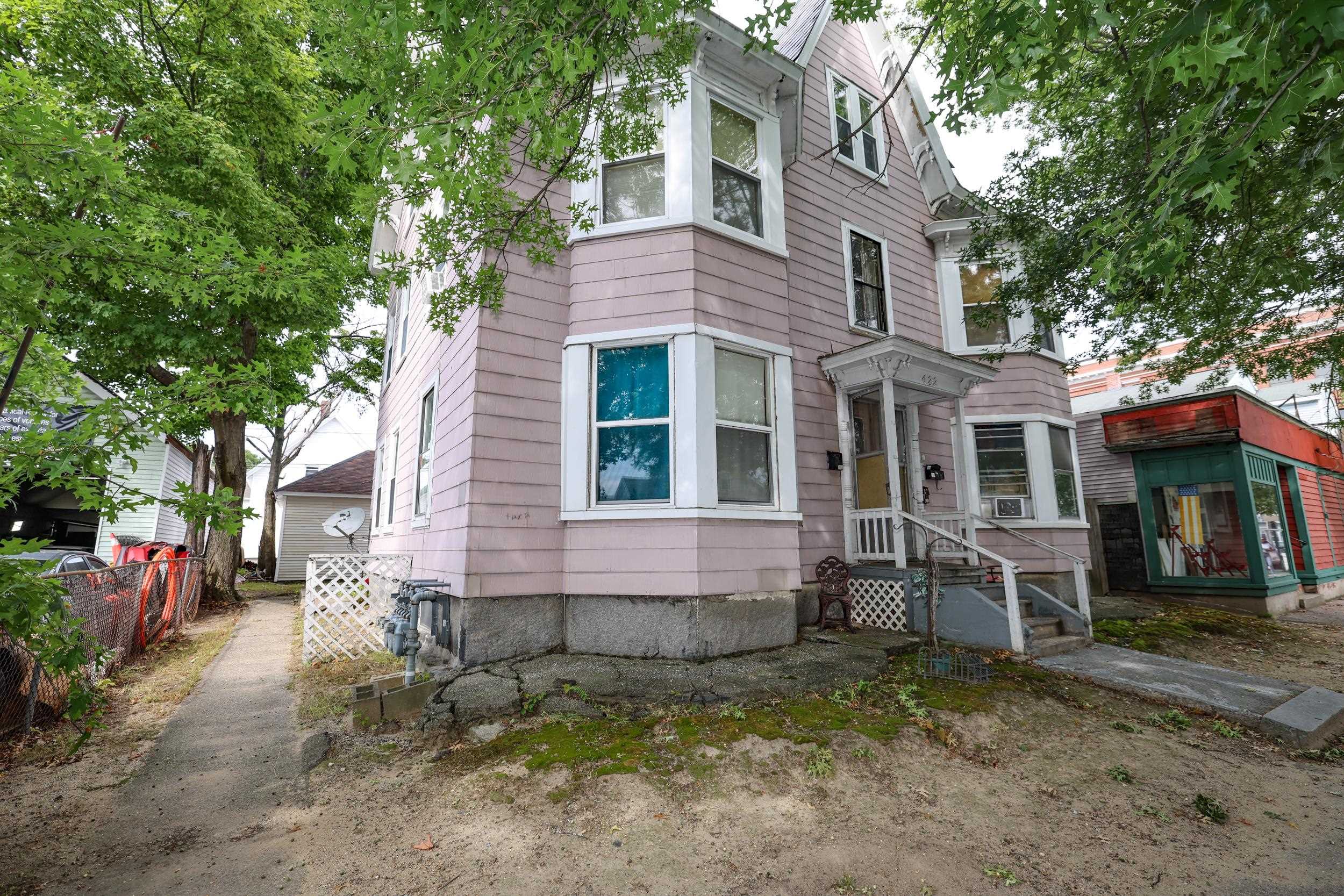 Photo 3 of Multi family home for sale at 422 Lake Ave, Manchester, NH 03103 | MLS# 5109960 | Listing updated on 2026-09-16