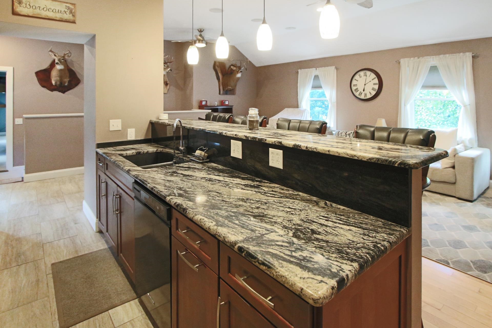 Photo 2 of Single family home for sale at 12 Stonehaven Rd, Nashua, NH 03062 | MLS# 5110422 | Listing updated on 2026-09-19