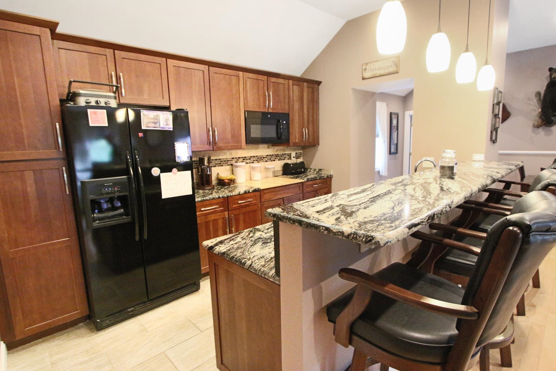 Photo 3 of Single family home for sale at 12 Stonehaven Rd, Nashua, NH 03062 | MLS# 5110422 | Listing updated on 2026-09-19