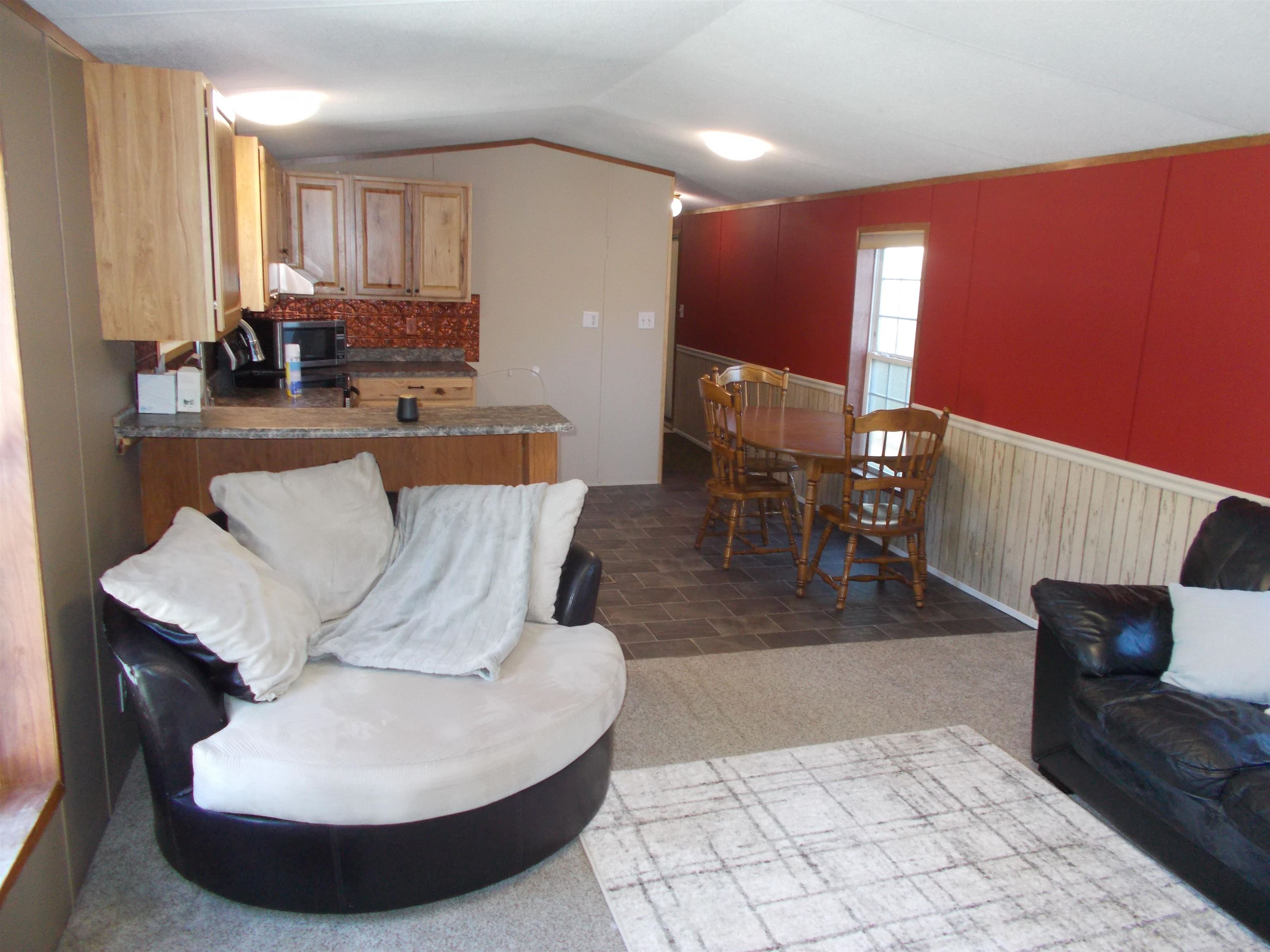 Photo 2 of Manufactured home for sale at 7 Dublin St, Gorham, NH 03581 | MLS# 5110652 | Listing updated on 2026-09-19