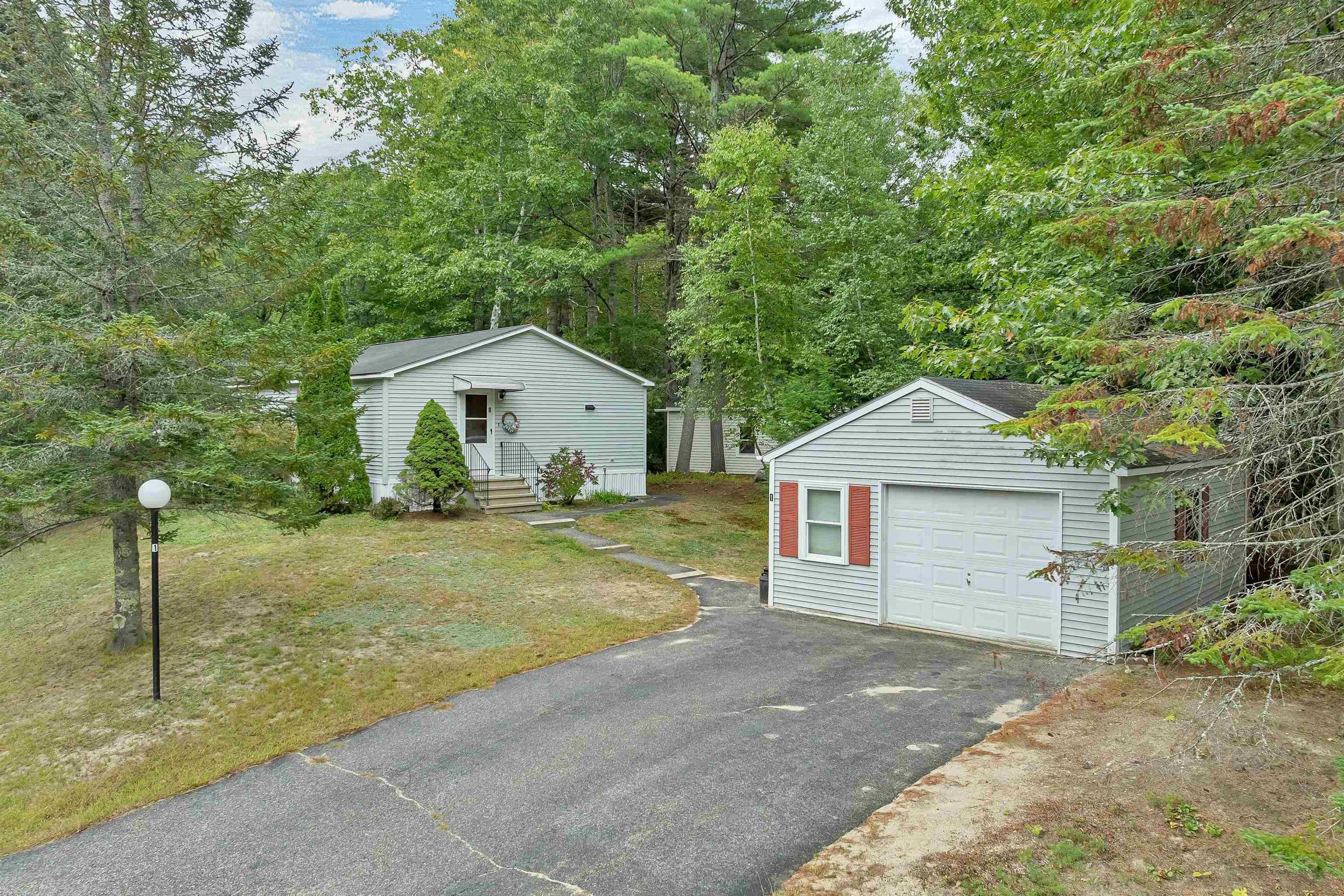 Photo 2 of Manufactured home for sale at 1 Harvey Brk Rd, Wolfeboro, NH 03894 | MLS# 5110804 | Listing updated on 2026-10-06
