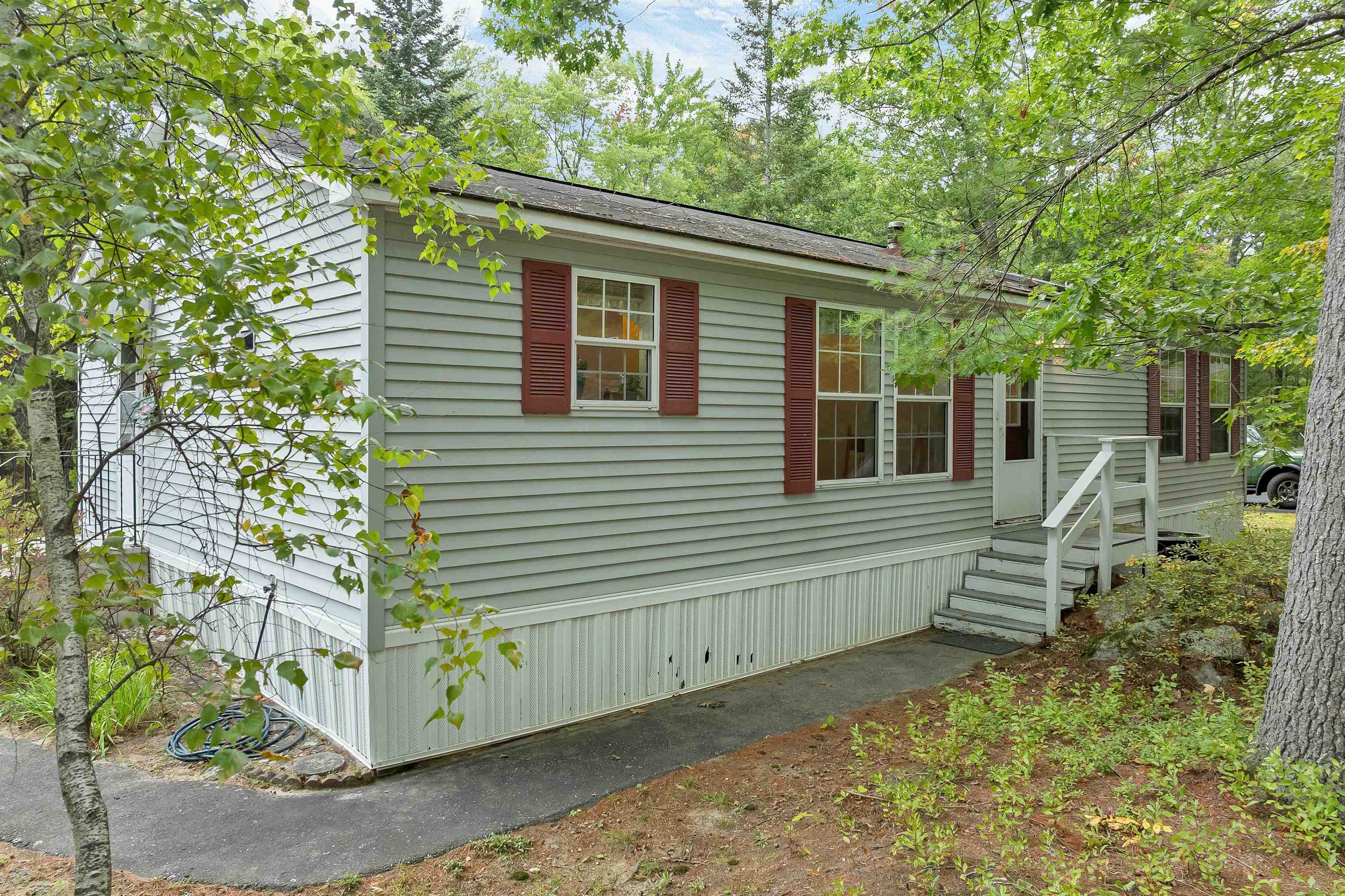 Photo 3 of Manufactured home for sale at 1 Harvey Brk Rd, Wolfeboro, NH 03894 | MLS# 5110804 | Listing updated on 2026-10-06