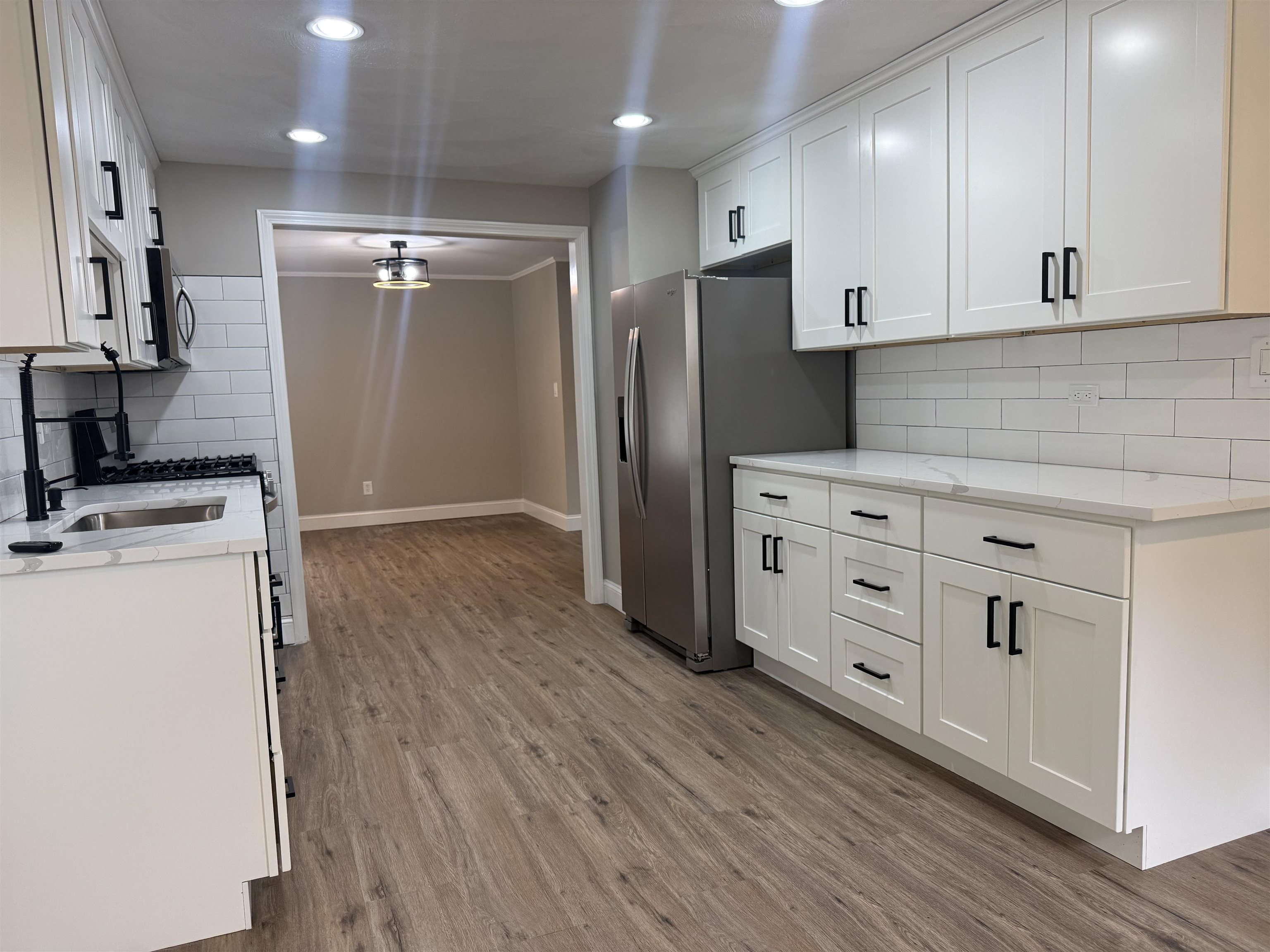 Photo 4 of Single family home for sale at 15 Meade St, Nashua, NH 03064 | MLS# 5114323 | Listing updated on 2026-10-17