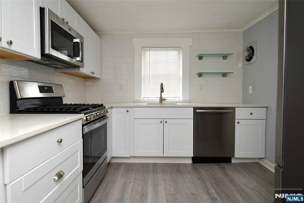 ANOTHER VIEW OF THE KITCHEN