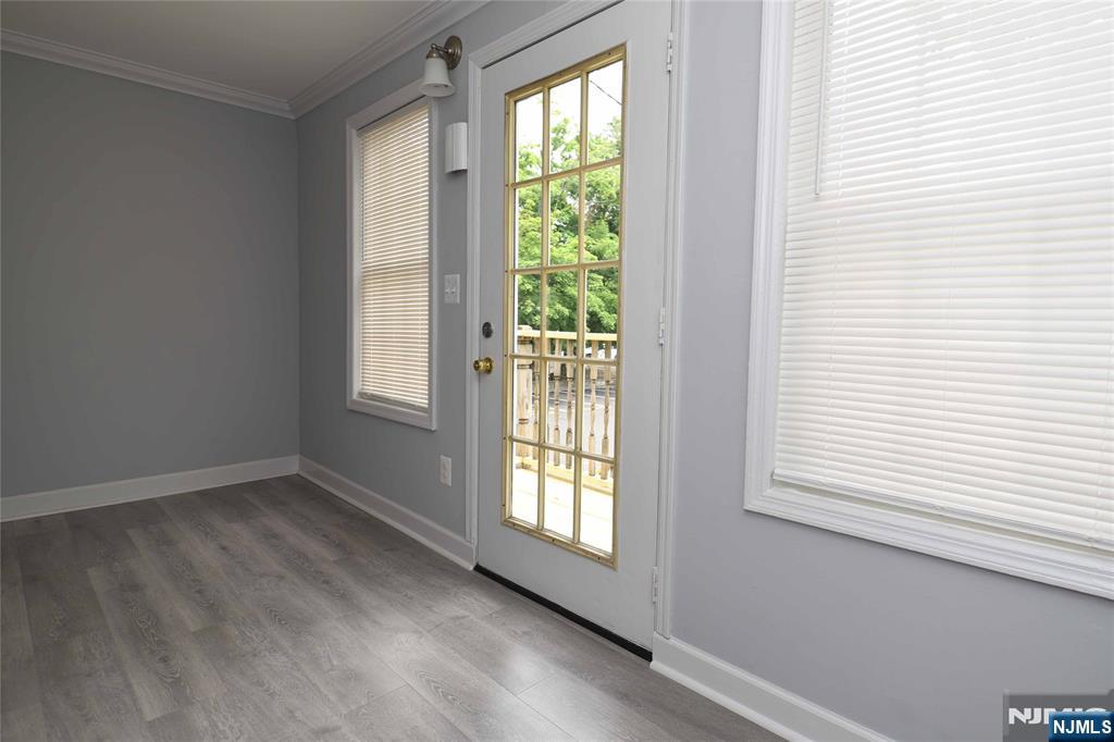 EXTRA BACK RM FOR 1 BR. DR TO DECK & STAIRS TO PARKING
