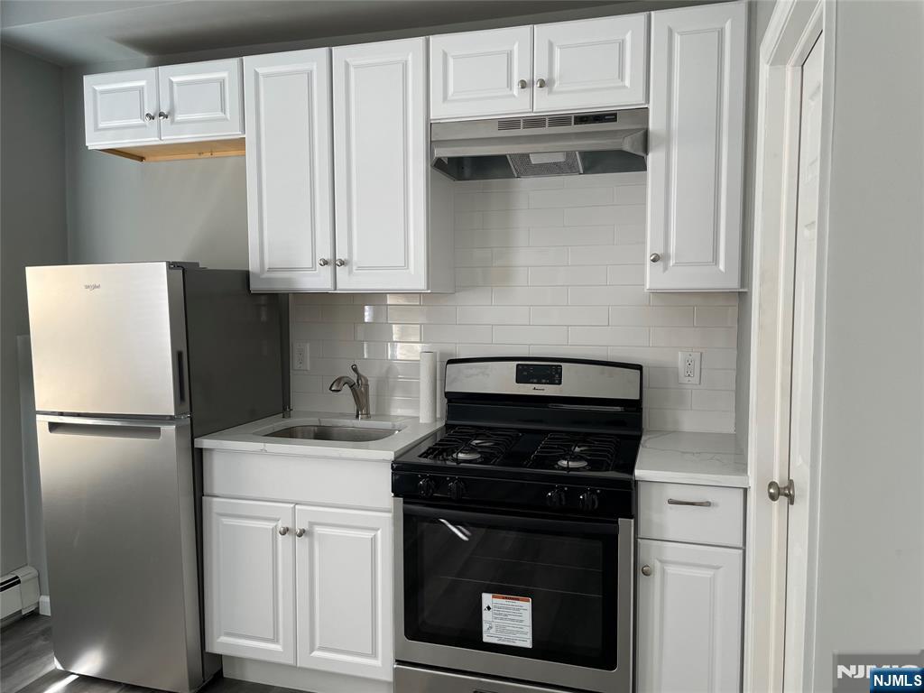 2ND PICTURE OF NEWER KITCHEN