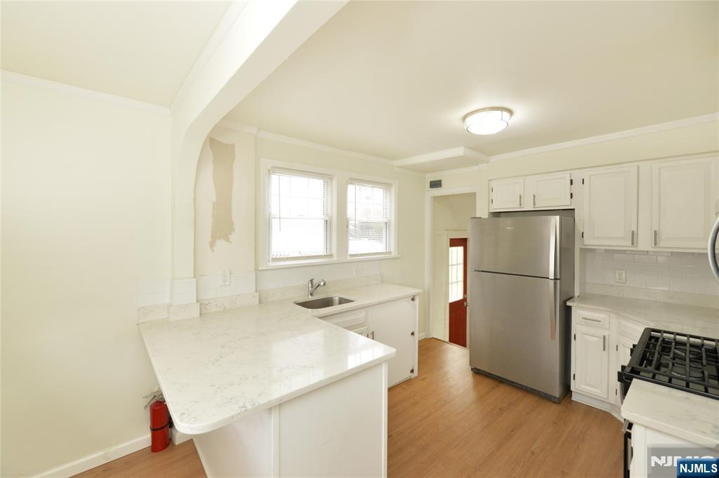 kitchen with side door access via driveway