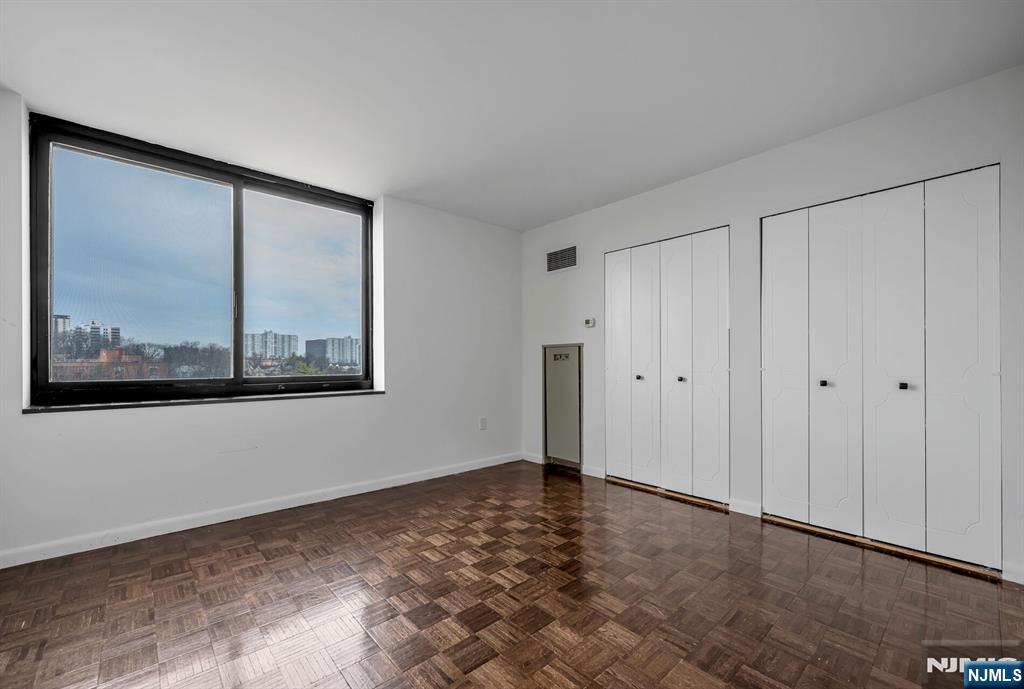 Primary with double closets plus a walk-in closet