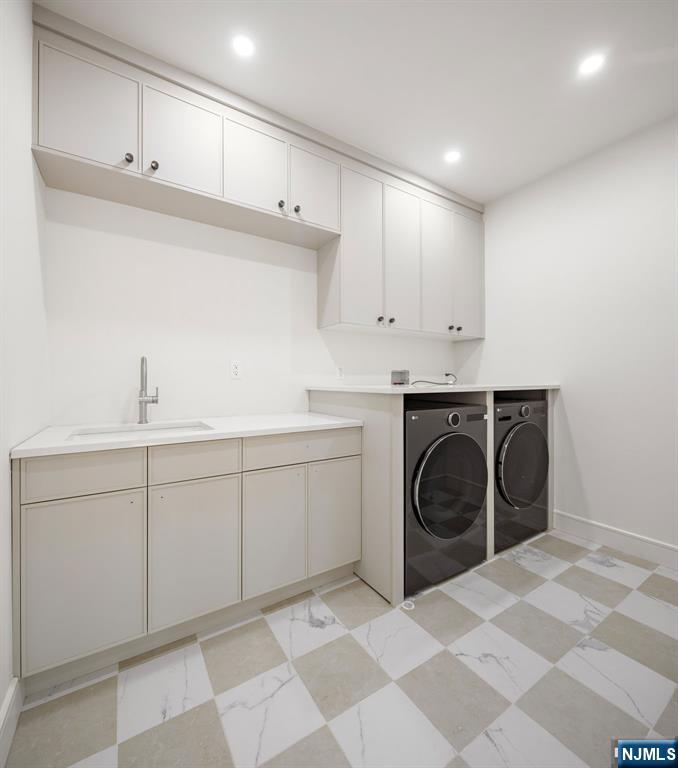 A convenient laundry room complete the second floor