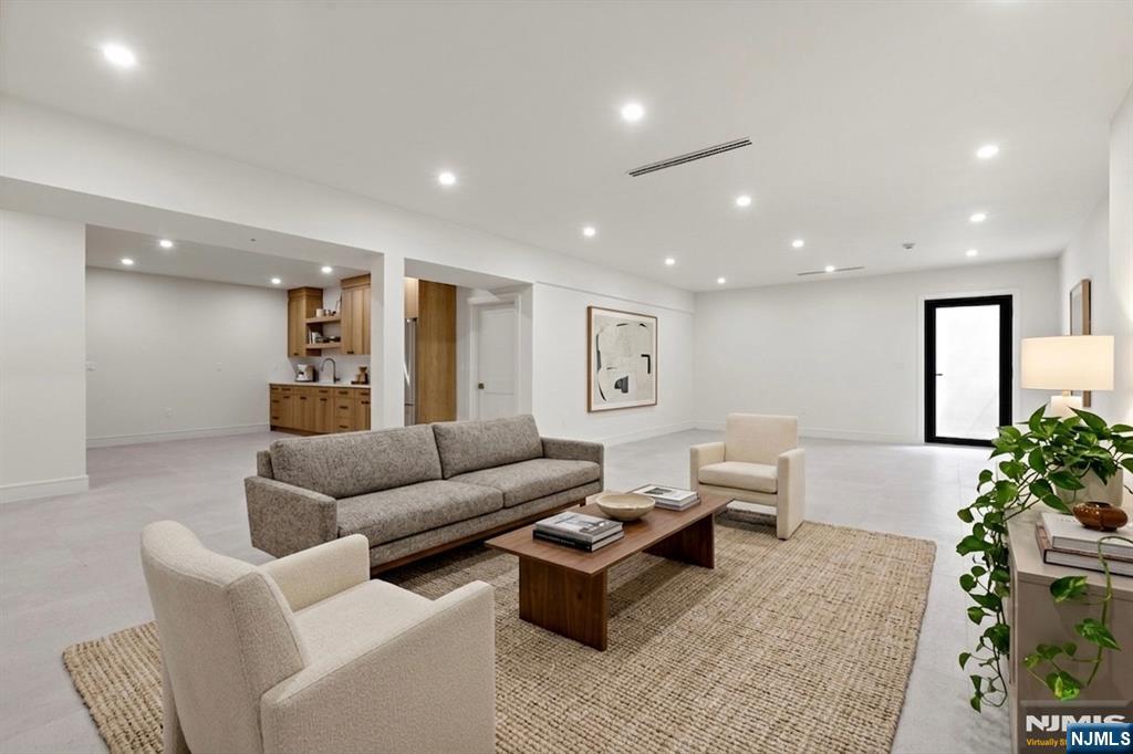 Recreation space with entertainer's bar, ideal for entertaining or extended living