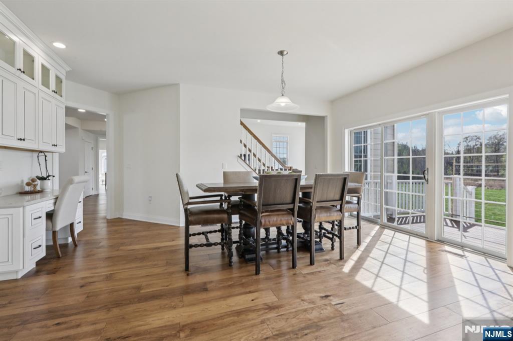 Adjacent Dining area and Desk area with sliders to rear deck