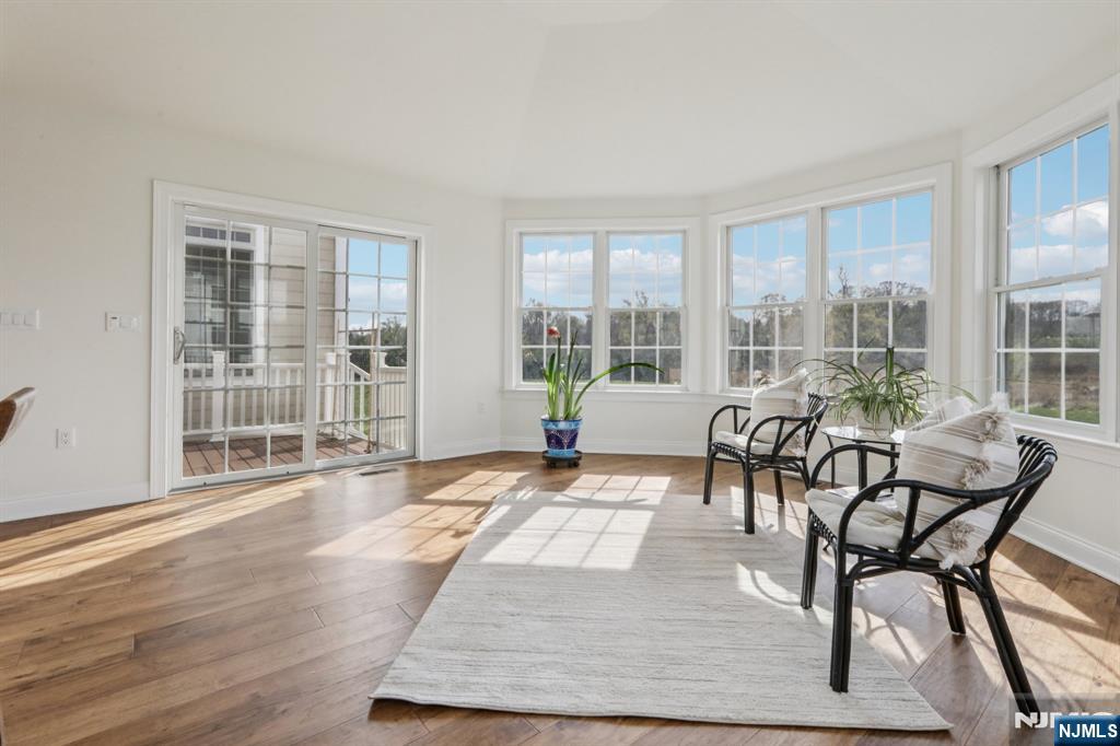 Breakfast room with outside access and walls of windows