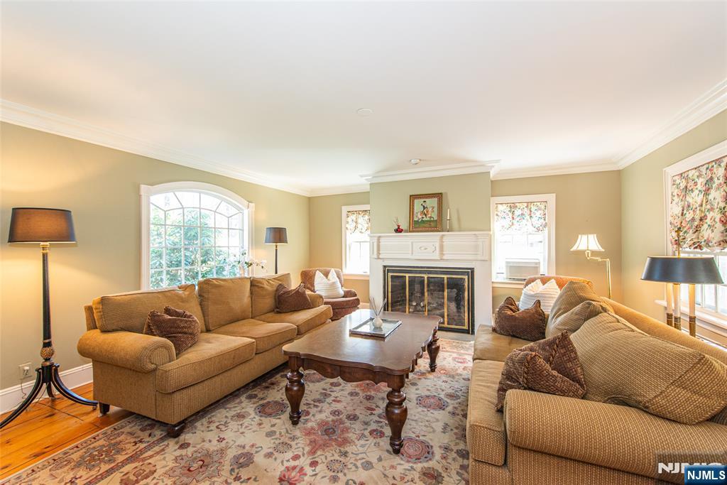 Living room with wood burning fireplace