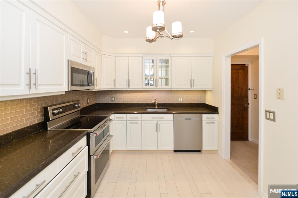 Kitchen has table space.