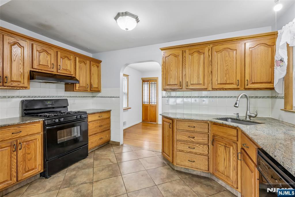 Cabinets all along the kitchen