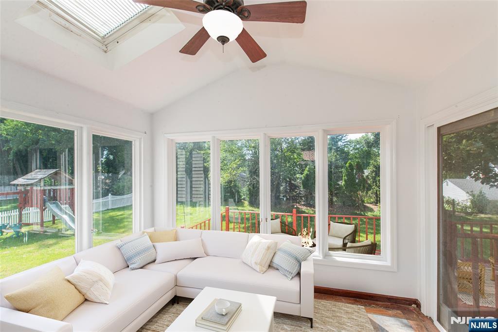 Sunroom with wall of windows