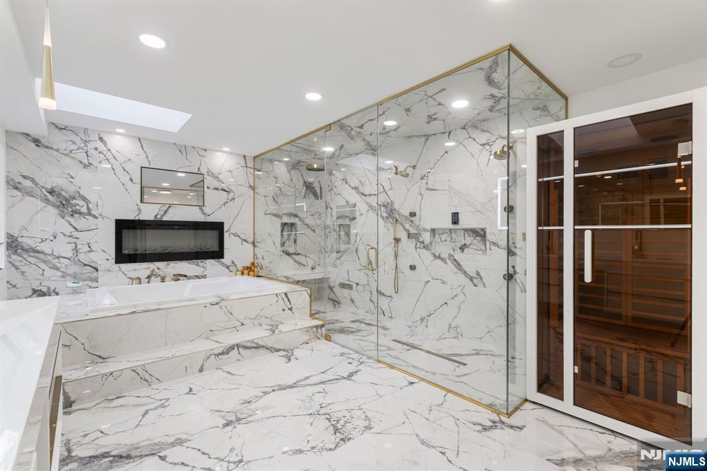 Complete with a Spacious Spa Bath & Sauna