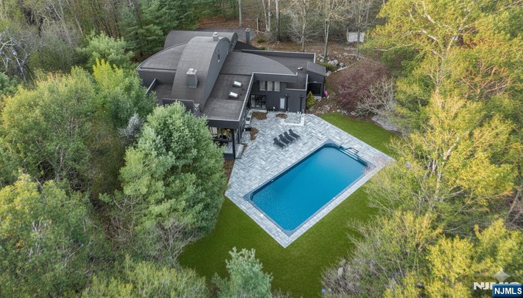 Set within one of New Jerseyâ€™s most coveted Private Lake Communities