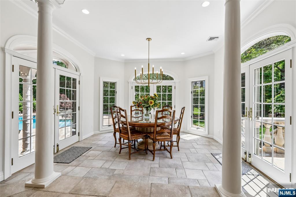 Feel like you are on vacation every day! Radiant Heated Breakfast Room to Patios!