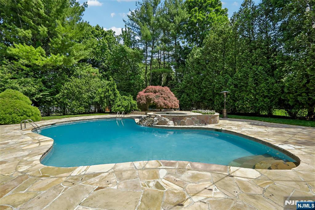 Freeform Pool w/Raised Spa and Waterfall,Tennessee Crabstone Decking