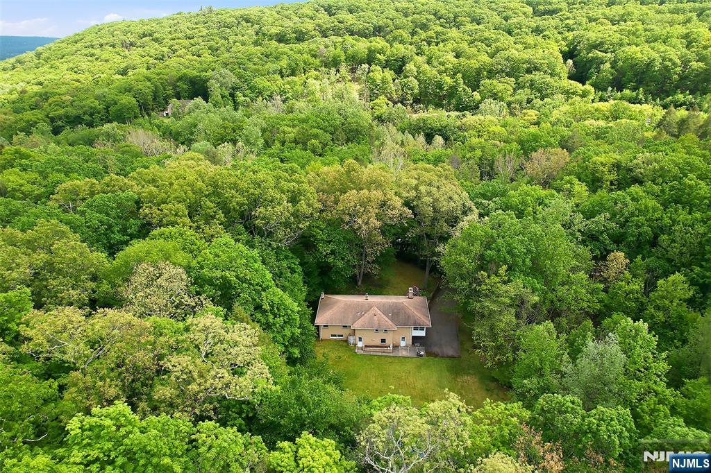 Spectacular Nature lovers dream! 1.5 acres surrounded by Permanent privacy!