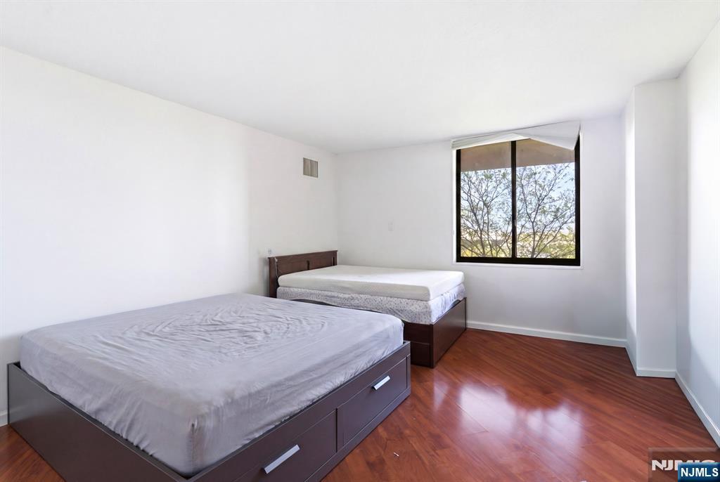 831 Harmon Cove Tower