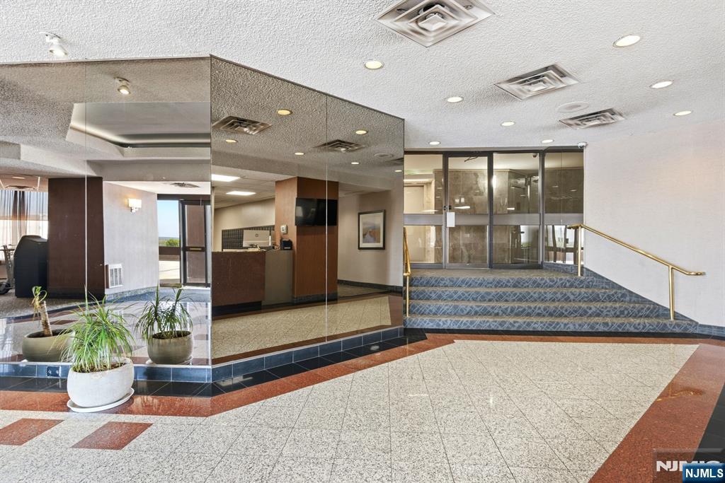 831 Harmon Cove Tower