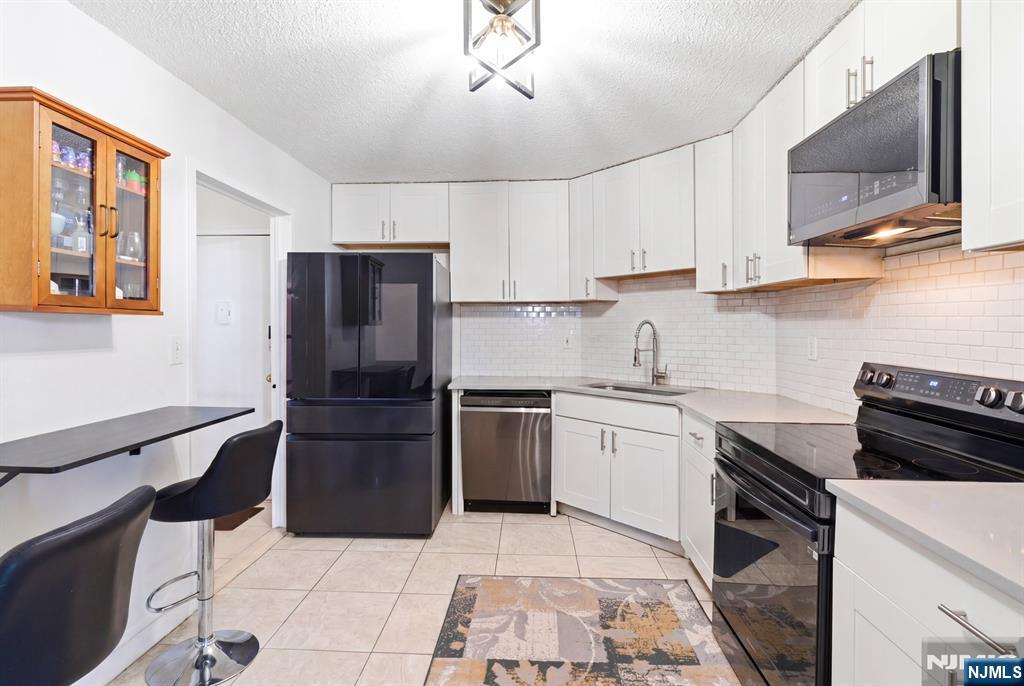 831 Harmon Cove Tower