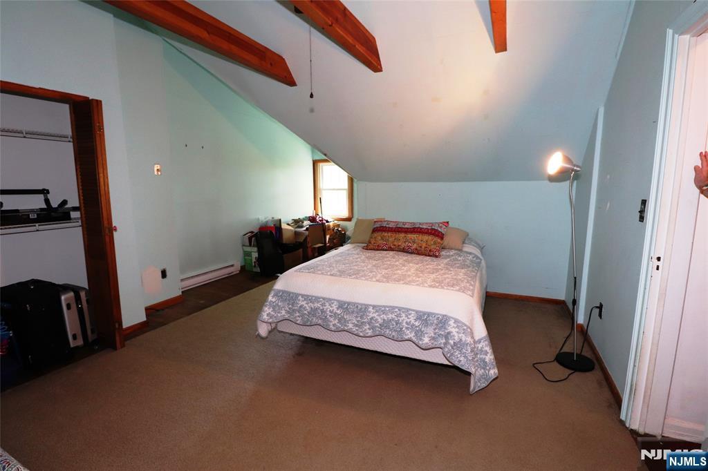 Unit 2 3rd floor Bedroom w/vaulted ceiling #3