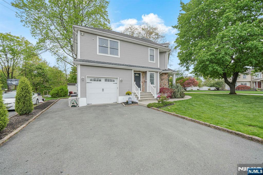 Welcome Home! Positioned on a rare corner lot with frontage on two streets, this unique property offers added flexibility including potential for a second driveway or detached garage/parking setup.