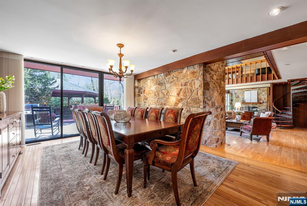 Open to the Formal Dining Room with a Sliding Door to the Bluestone Patio
