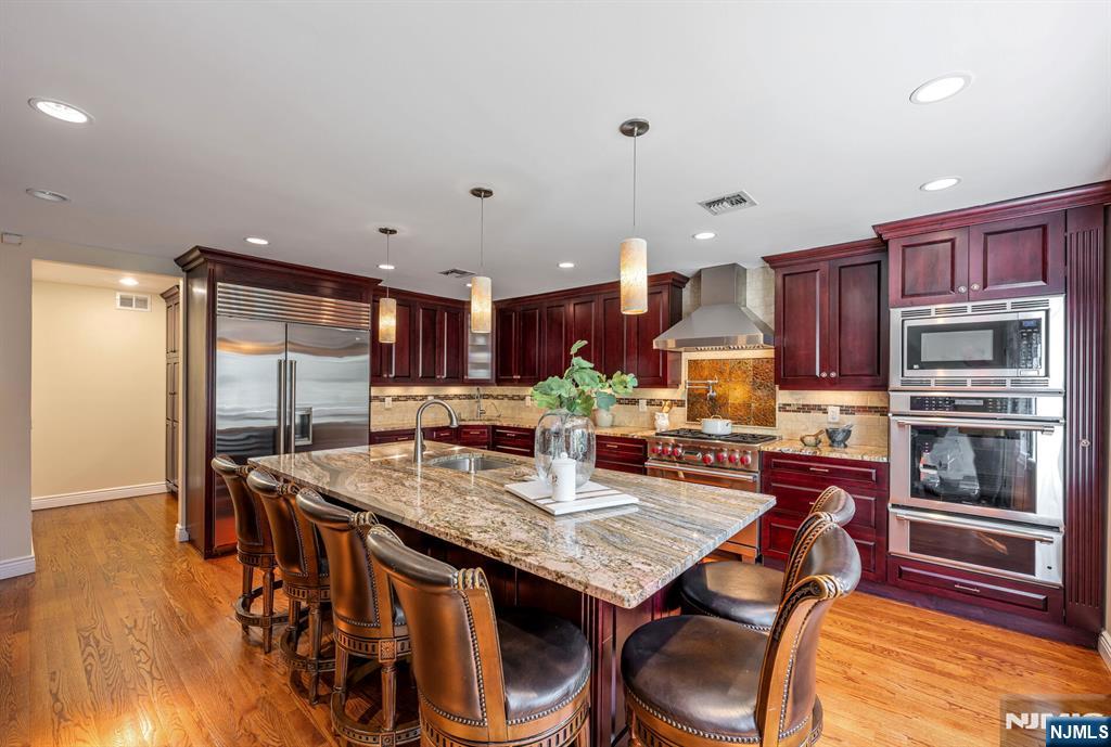 Custom Cabinets and High-End Stainless Steel Appliances