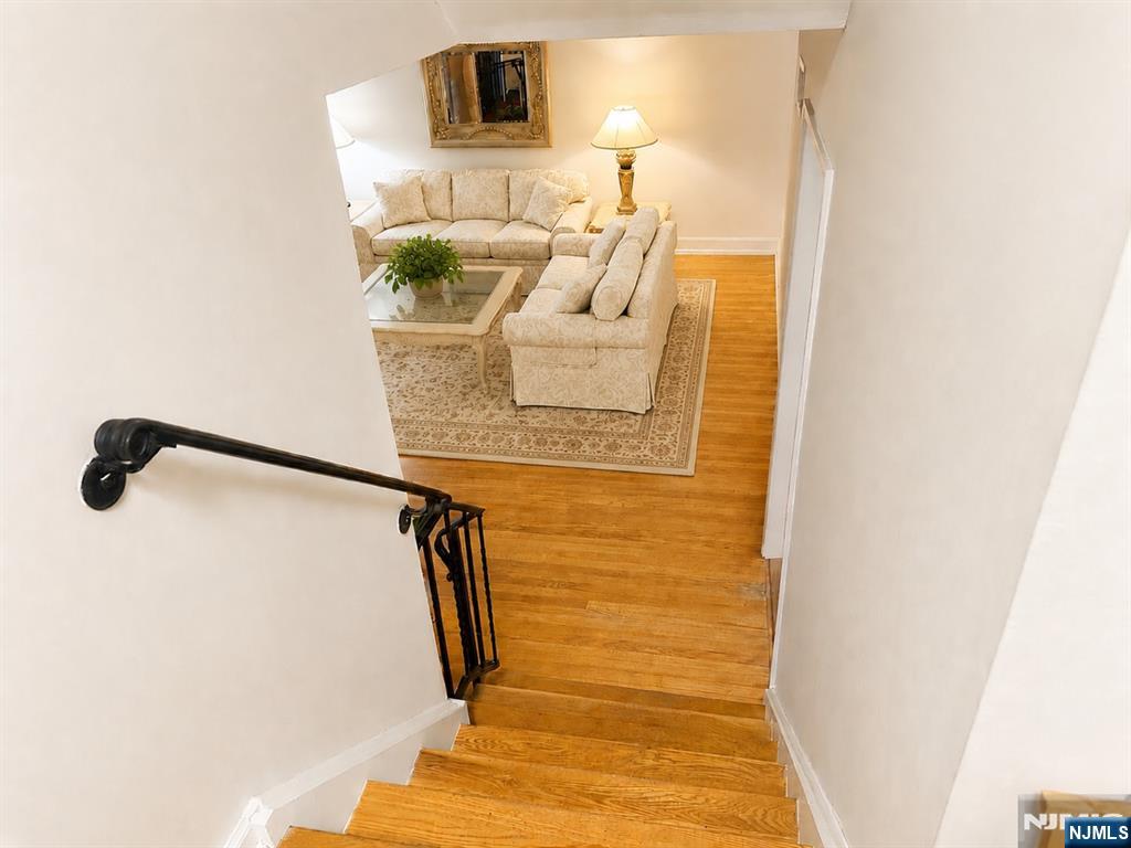 Livingroom looking down from upstairs. Virtually staged.