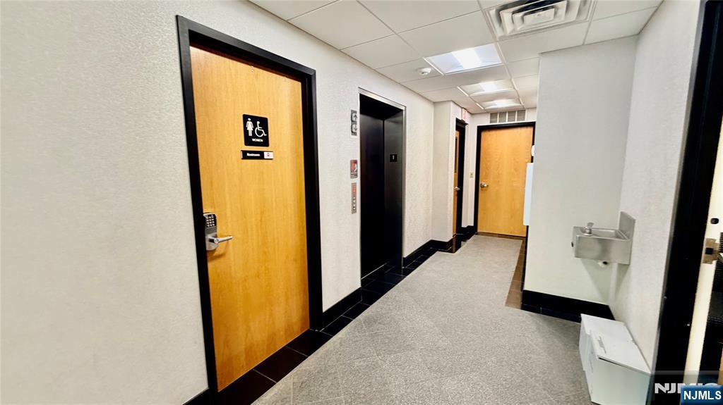 Hallway Bathrooms & Elevator