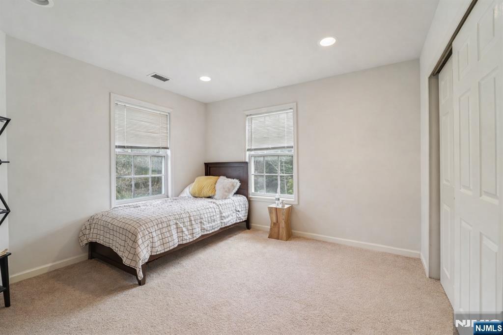 BedroomOne additional bedroom provides a bright and comfortable space perfect for guests, or a home office.