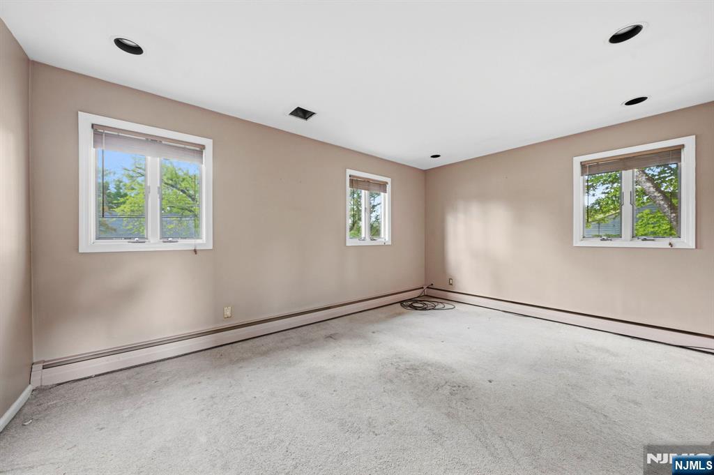 Bedroom #1 - Hardwood Under Carpet