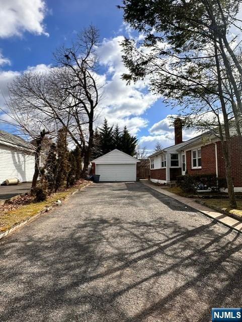 Garage with Large Driveway