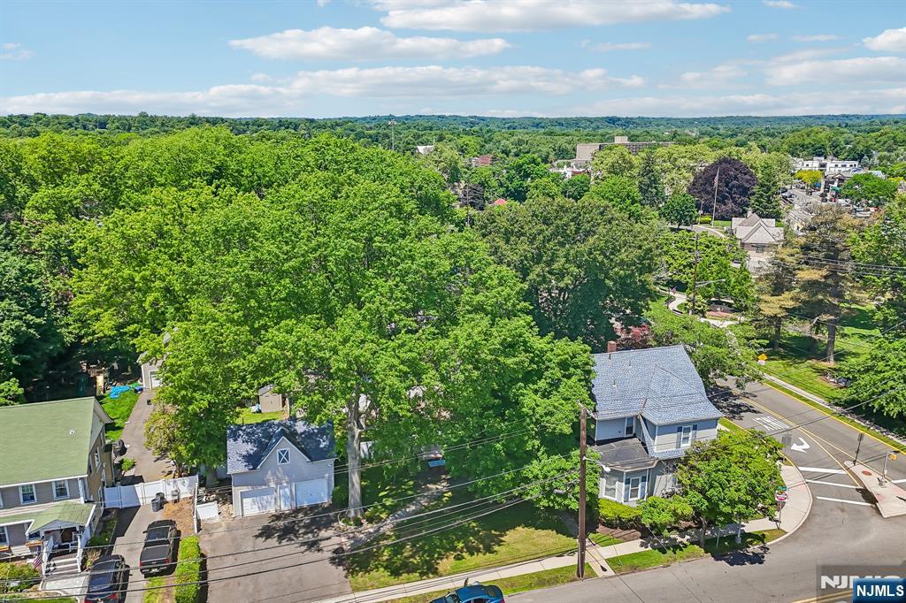 View of property w/garages