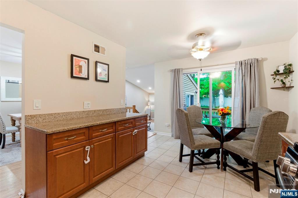 Kitchen w/ 2 opening to Foyer & Dining